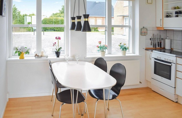 This terraced house is located only 50 m from the harbor in Lohals.