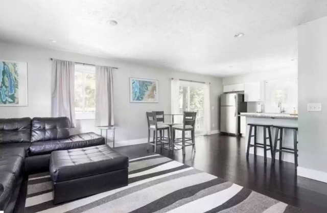 Torch Lake 4 bedroom home w/large yard & parking