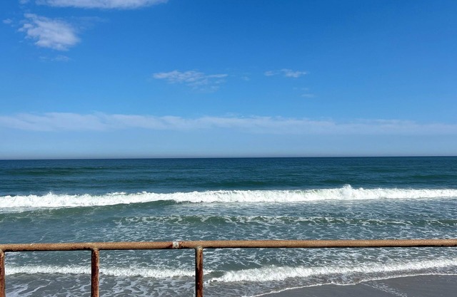 Tranquil 2-bedroom unit, Steps from the beach!