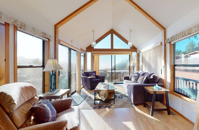 Tranquil dog-friendly coastal escape with private hot tub, patio, & nature views