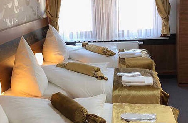 Triple room (1 double room, 2 single beds), incl. Breakfast - Hotel Im Anker