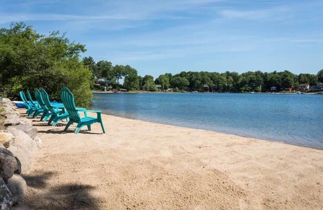 Tucked down a long dirt drive, this property is private, serene & has an awesome beach front!