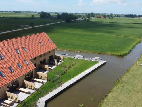 Two adjacent luxury villas in Friesland