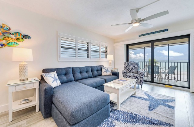 Two-bedroom top floor coastal themed with an awesome panoramic view.