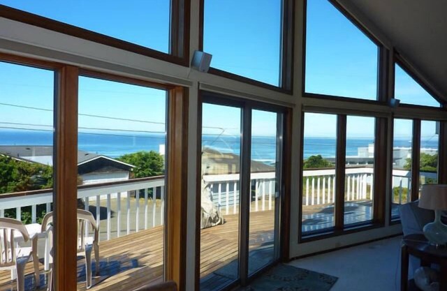 Two KING size beds with sweeping Ocean Views, Easy Beach Access & Game Room!