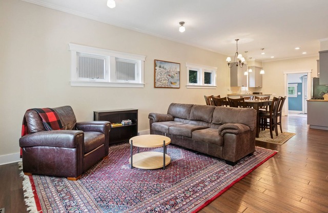 Two-story, dog-friendly home with a fenced yard, patio & washer/dryer