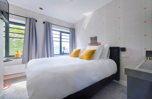 Unique apartment with private kitchen and bathroom, inspired by the abstract art of Lena Milius.