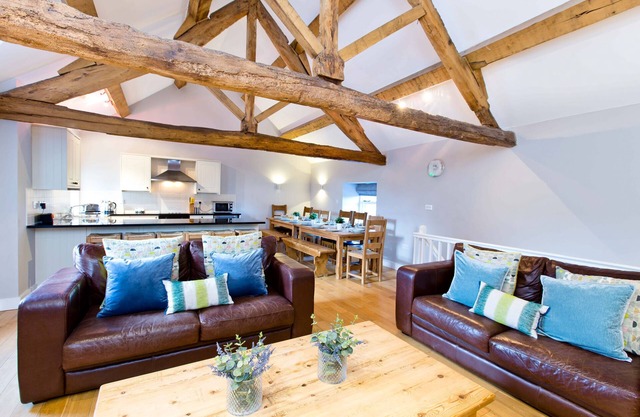 Unique barn conversion, sleeps up to 6 in 3 bedrooms, near to High Peak Trail.