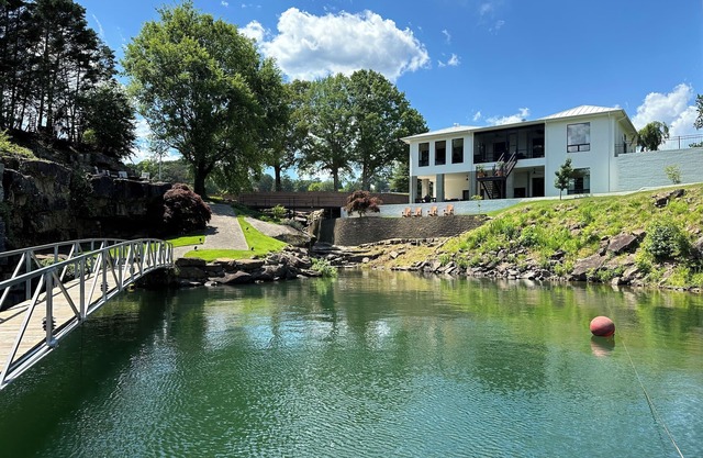 Unique home on the waters edge with no stairs to lake & pontoon rental option