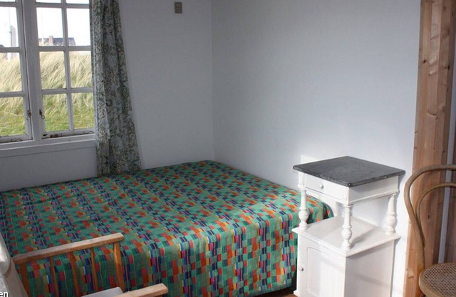 Unique, over one hundred year old vacation home in 1st row to the beach