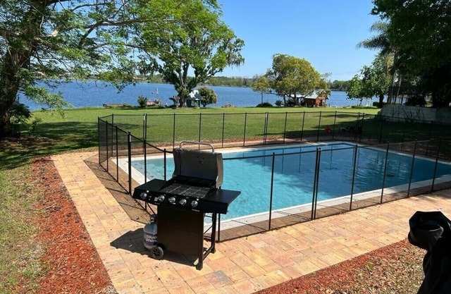 Universal Studios LAKE HOUSE RETREAT with 5 bedrooms and a private pool.
