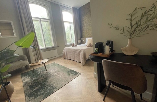 Unwind in this refined suite, blending modern comfort with historic charm.
