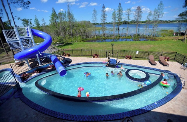 Up to 45 People Can Stay At This Lakefront GAME-FILLED Mansion on 10 Gated Acres