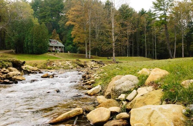Updated Farmhouse Near the Parkway, w/ 11 acre Park w/ Stream/ Ponds/ Disc Golf!