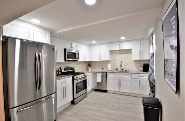 Updated Lower Unit with Yard and Garage