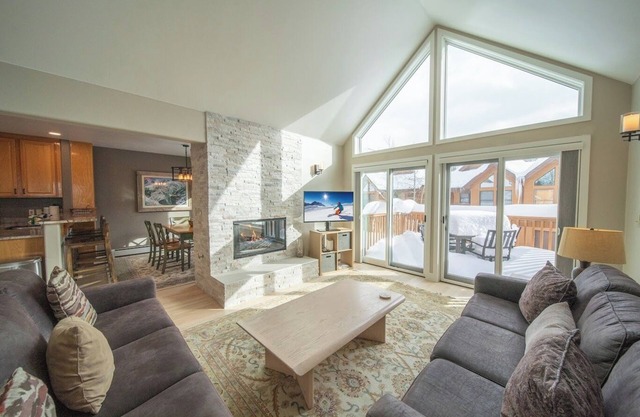 Updated with a private garage and hot tub onsite
