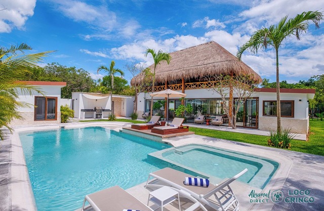Upscale villa in gated community of Yal Ku Ha with Lagoon access!