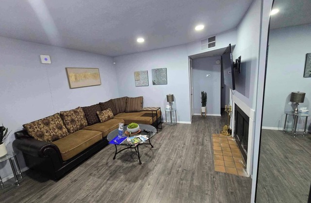 UPTOWN LOCATED! Lovely with fireplace & Garden