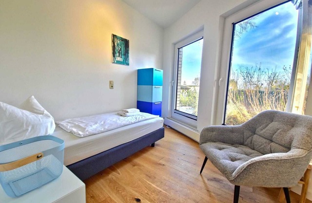 Vacation apartment 4 - Schwalbennest: comfort, dog welfare with a view of the Achterwasser