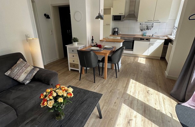 Vacation apartment Kleine Sundpfote with large garden.