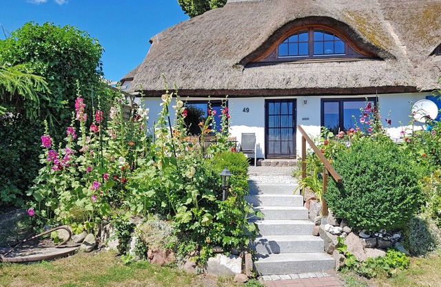 Vacation home with thatched roof and quiet location