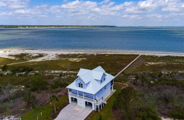 Very Rare BEACHFRONT Home w/Pvt Boardwalk to Beach, Golf cart. A dream come TRUE