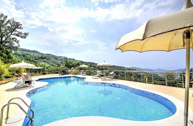 Villa Albatros A: A charming two-story villa surrounded by the greenery, with Free WI-FI.