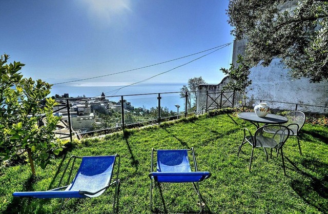 Villa Arletta: A characteristic two-story ancient house located on a hillside, facing the sea.