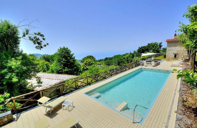 Villa Cibele: An elegant and welcoming three-story villa in a quiet position, located on a hillside above the sea, with Free WI-FI.