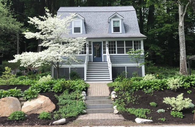 Walk into town, soak up sun on enclosed porch & steps away from nature trails!