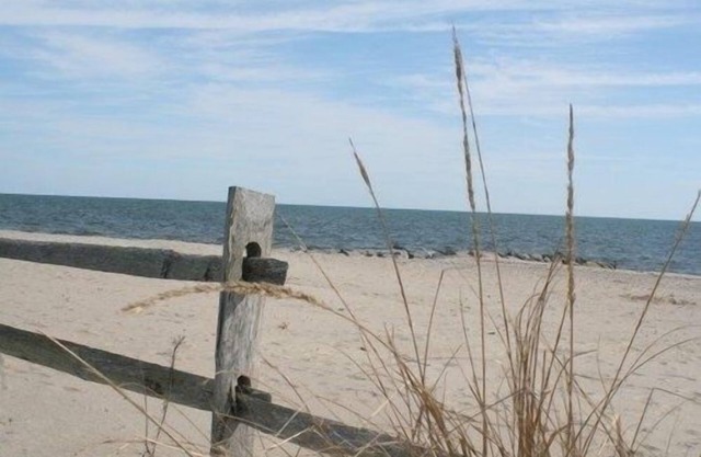 Walk to the beach from this charming home in beautiful West Harwich