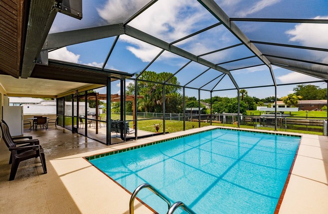 Waterfront Home with Private Heated Pool, Dock, Wifi