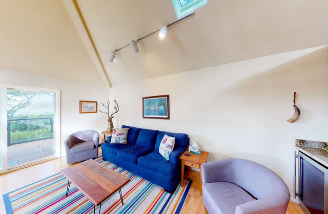 Waterfront home with hot tub, balconies, grill, & woodstove - dog-friendly