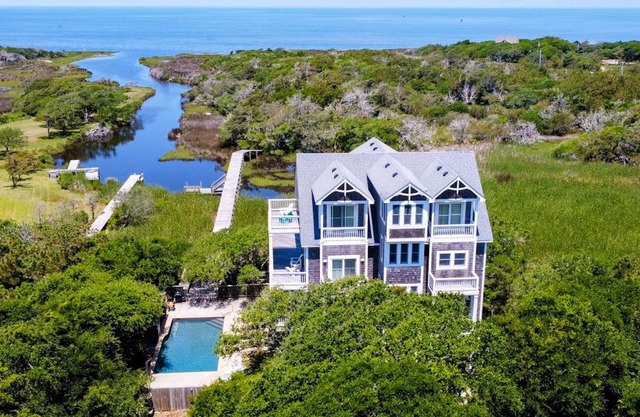 Waterfront home with ocean views, private pool & hot tub