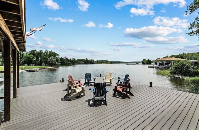 Waterfront w/room to gather & beautiful lake views! Lakeside firepit w/swings