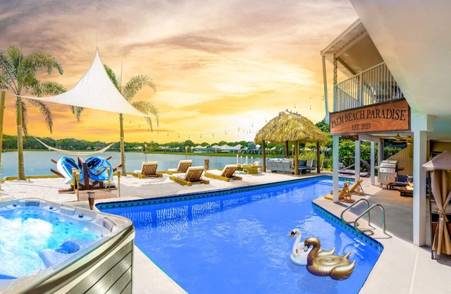 Waterfront w/Beach Htd Pool Cinema Game Room Tiki