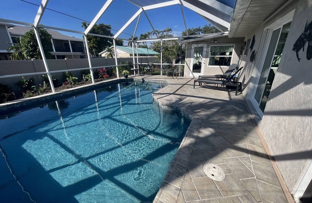 We are back! Private ground level, heated pool! 6 houses to the beach access!