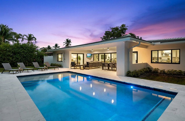 Welcome to Manatee Harbor, A Heated Pool Home with Walkable Beach Access!