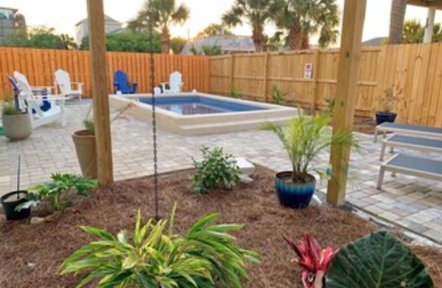 Wonderful Home! Pool with shaded outdoor living space! Walker's paradise! Dogs!
