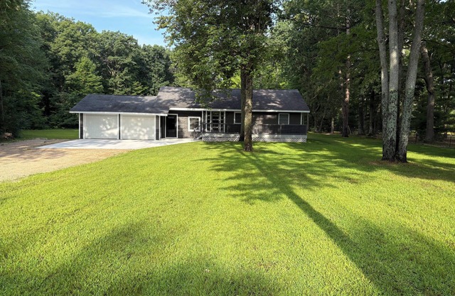 Year-round 3BR/2BA trailside house & 4 electric campsites near Lake Missaukee