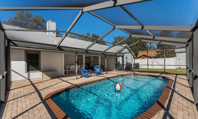 Ocala House | 1 acre private retreat with pool, firepit, volleyball, basketball & open concept