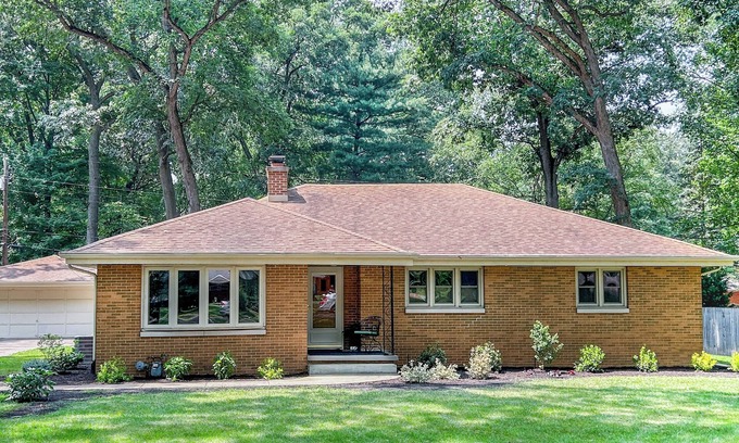 South Bend House | 1 mile from ND! Beautifully renovated and roomy 4-bed, 3-bath home, wooded lot.
