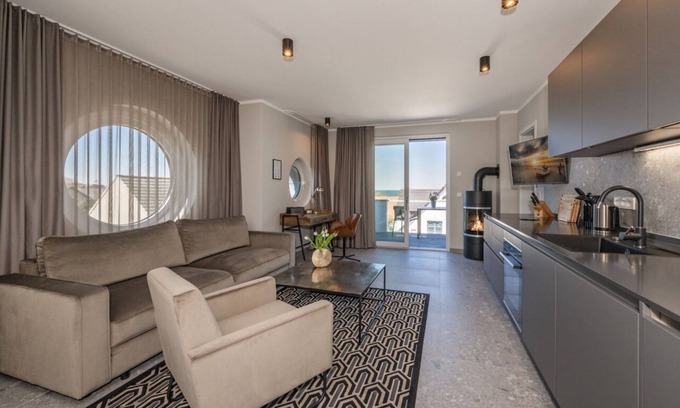 Lubmin Apartment | 150m to the beach! Modern 60m² sea view apartment: balcony & fireplace, for 4 pers.