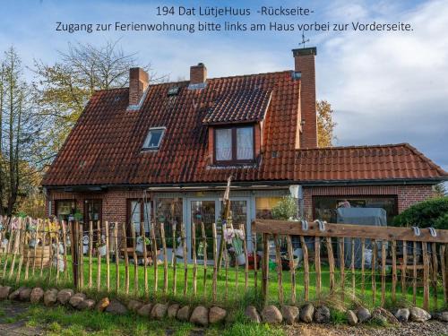 Luetjenburg Apartment | 194 Fewo Dat LütjeHuus mit Dachterrasse im ersten Stock
