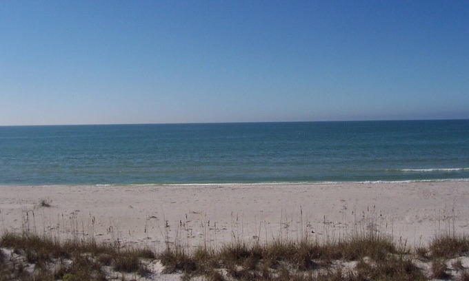Palm Island Cottage | 2 bedrooms, 2 bath Cottages, Palm Island, Beach Access, Heated Pool, Boat Dock