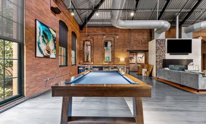 Strip District Apartment | 2BR Historic Loft Oasis With Pool & Gym