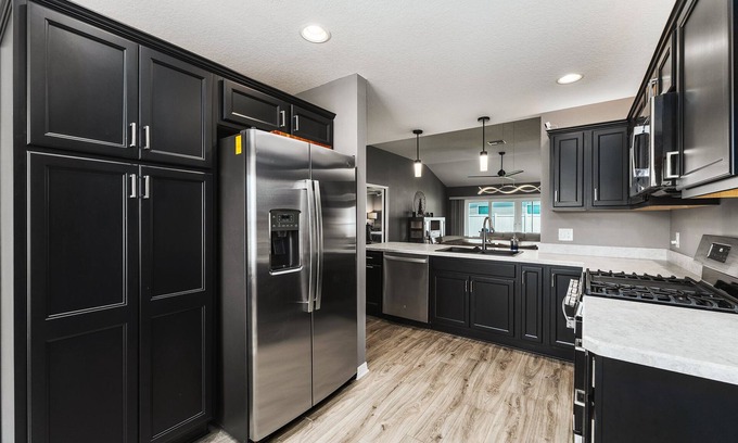 Wildwood House | 3 Bed 2 Bathroom Home in DeLuna with golf cart.