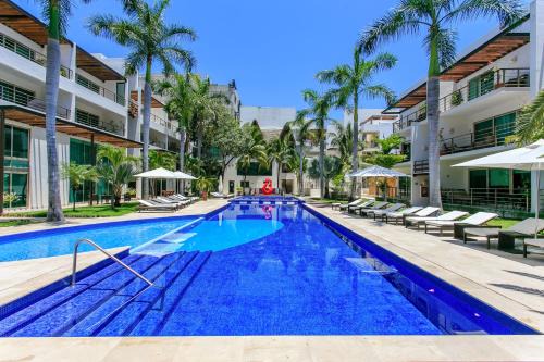Gonzalo Guerrero Apartment | 3-Level Condo with a Private Balcony & Rooftop Lounge