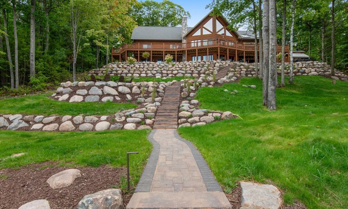 Lac du Flambeau House | 3-story chalet with private hot tub, game room & waters toys - dog-friendly