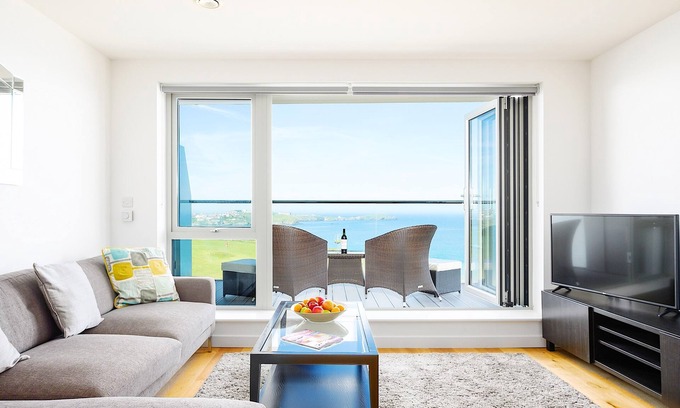 Lusty Glaze Apartment | 32 ONE Lusty Glaze - Apartment with breath taking sea and coastal views, lift, car parking